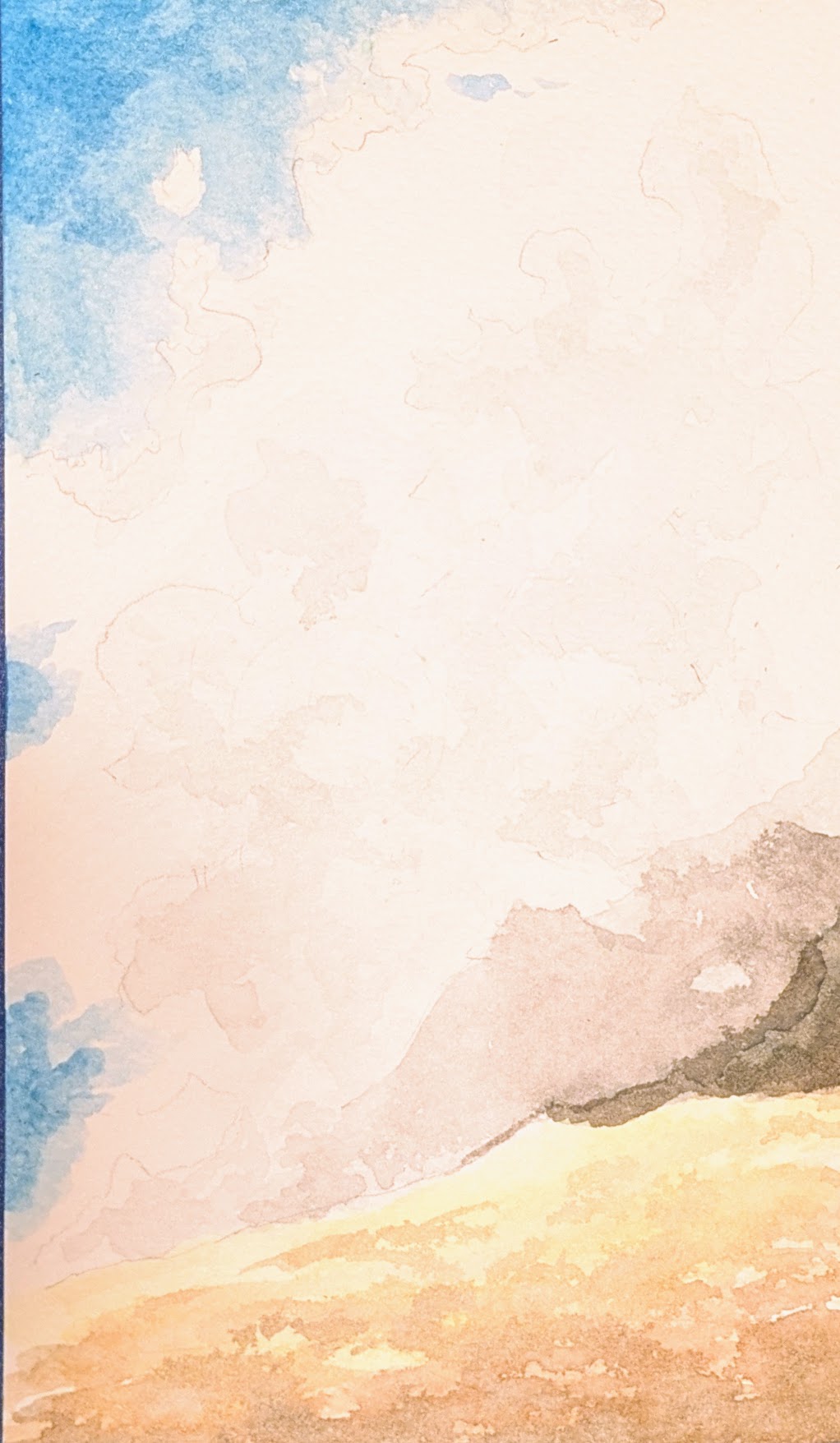 A rocky, scrubby, sun-blasted hilltop